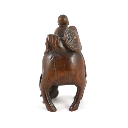 208 - A Chinese bamboo group of boy riding a buffalo, 18th/19th century, of caramel brown patina, 12.5 cm ... 