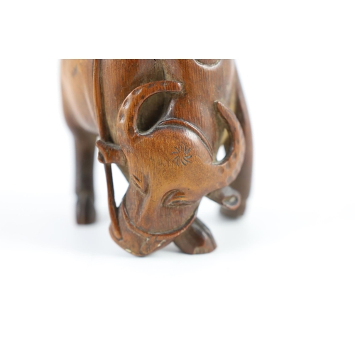 208 - A Chinese bamboo group of boy riding a buffalo, 18th/19th century, of caramel brown patina, 12.5 cm ... 