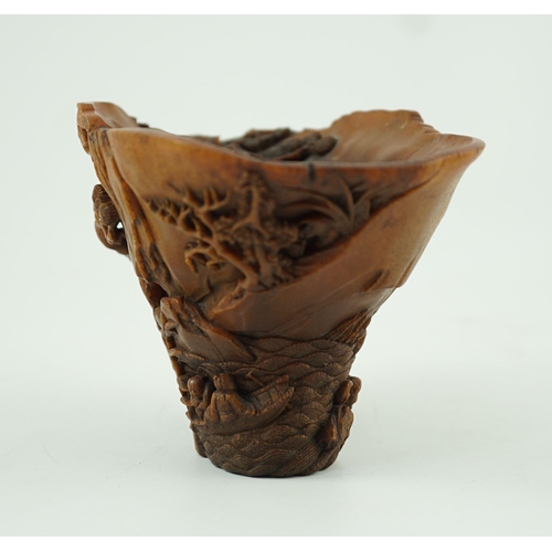 211 - A fine Chinese rhinoceros horn Ode to the Red Cliff libation cup, 17th/18th century, carved in hig... 