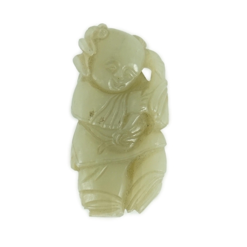 217 - A Chinese celadon jade figure of a boy holding a lotus sprig, 19th century 5.2 cm high