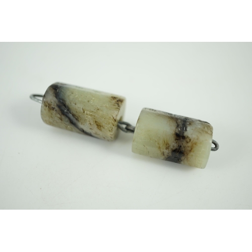 218 - Two Chinese grey and black seal script inscribed jade beads, possibly Han dynasty, each of octagonal... 