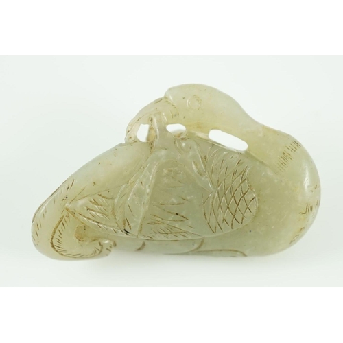 221 - A Chinese pale celadon jade carving of a duck, possibly Jin-Yuan dynasty its head turned backward an... 