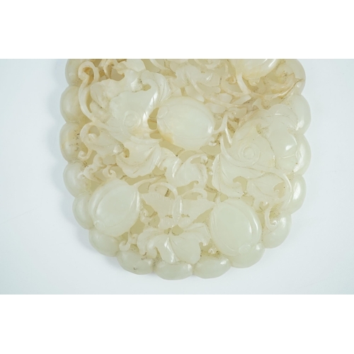 227 - A Chinese pale celadon jade oval openwork plaque, 19th century, probably taken from a ruyi sceptre, ... 