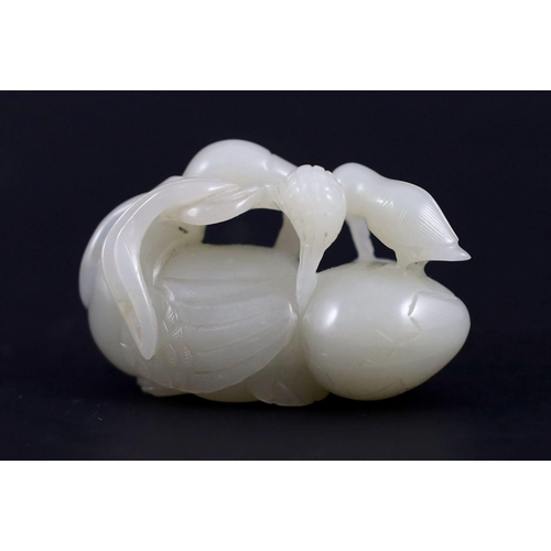 238 - A Chinese pale celadon jade duck group, carved as a duck and chick on an egg eating millet, 5.5 cm l... 