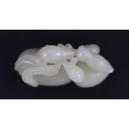 238 - A Chinese pale celadon jade duck group, carved as a duck and chick on an egg eating millet, 5.5 cm l... 