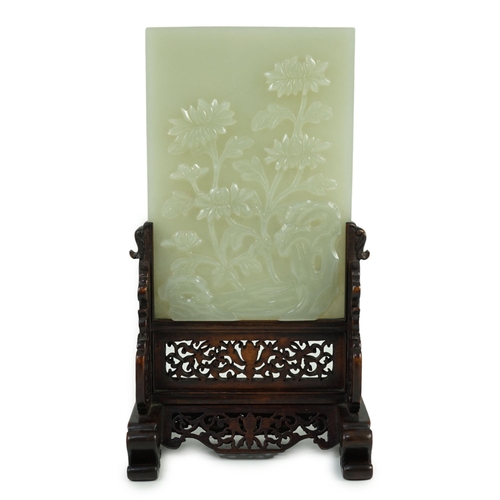 241 - A good Chinese celadon jade peonies and rockwork small table screen and stand, 18th/19th century, ... 