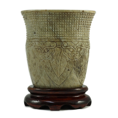 242 - A Chinese archaistic burnt chicken bone jade oval cup, chan, probably Song dynasty, carved in low ... 