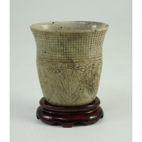 242 - A Chinese archaistic burnt chicken bone jade oval cup, chan, probably Song dynasty, carved in low ... 