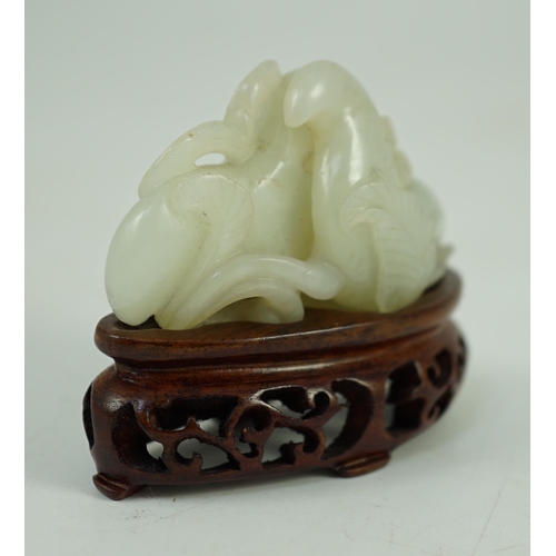 244 - A Chinese pale celadon jade Lotus pebble carving, 18th/19th century, the stone of good even tone w... 