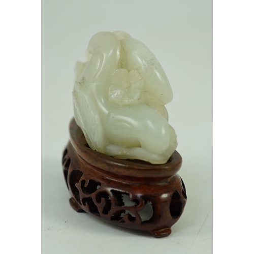 244 - A Chinese pale celadon jade Lotus pebble carving, 18th/19th century, the stone of good even tone w... 