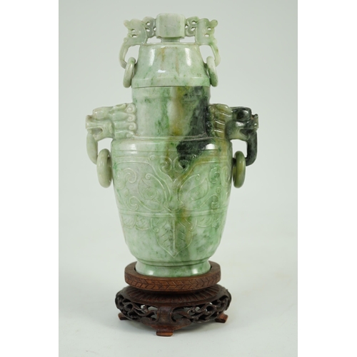 246 - A Chinese archaistic jadeite two-handled vase and cover, first half 20th century, of flattened balus... 