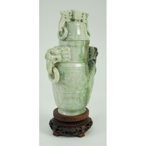 246 - A Chinese archaistic jadeite two-handled vase and cover, first half 20th century, of flattened balus... 