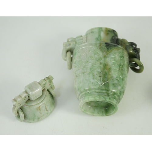 246 - A Chinese archaistic jadeite two-handled vase and cover, first half 20th century, of flattened balus... 