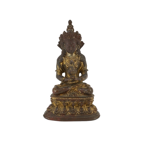 253 - A Tibetan gilt copper alloy figure of Amitayus, 16th/17th century, on a double lotus throne, formerl... 