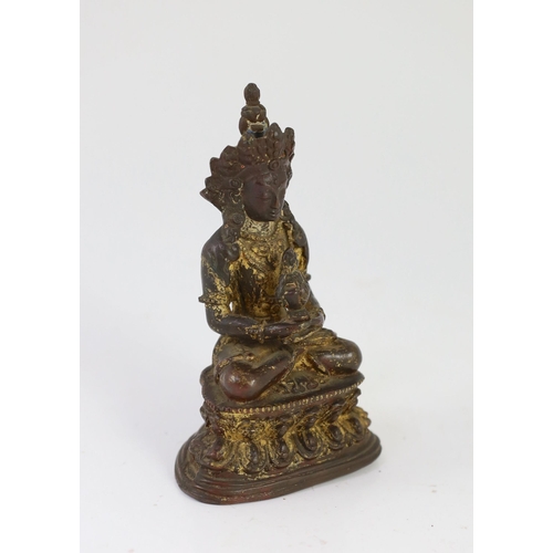 253 - A Tibetan gilt copper alloy figure of Amitayus, 16th/17th century, on a double lotus throne, formerl... 