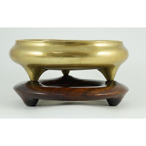 254 - A large Chinese polished bronze tripod censer, 19th century, private four character seal mark, 29.5 ... 