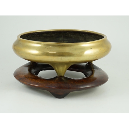 254 - A large Chinese polished bronze tripod censer, 19th century, private four character seal mark, 29.5 ... 