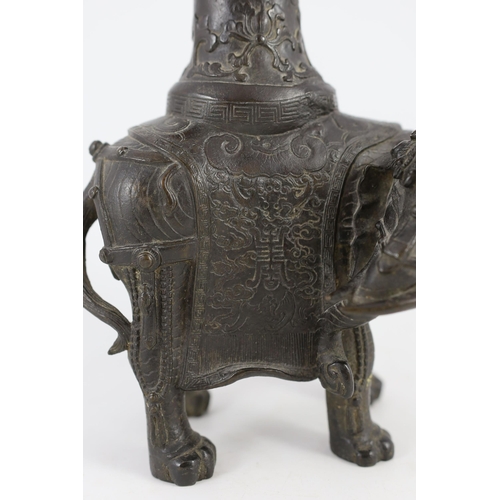 256 - A Chinese bronze elephant vessel, late Ming dynasty, modelled as a caparisoned elephant standing f... 