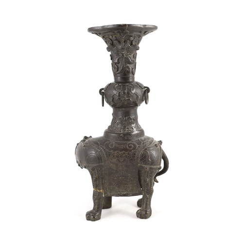 256 - A Chinese bronze elephant vessel, late Ming dynasty, modelled as a caparisoned elephant standing f... 