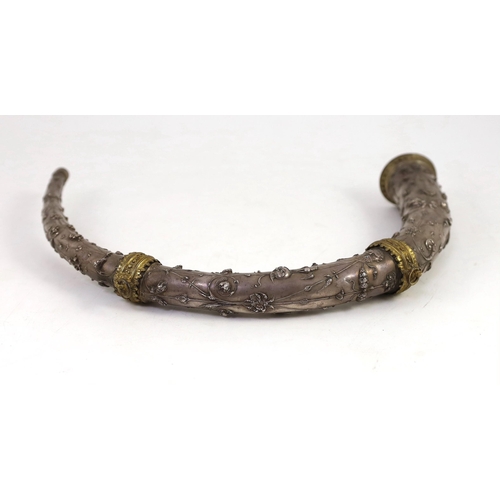 26 - A 19th century Italian white metal hunting horn, with ormolu mounts and flower and mask decoration, ... 