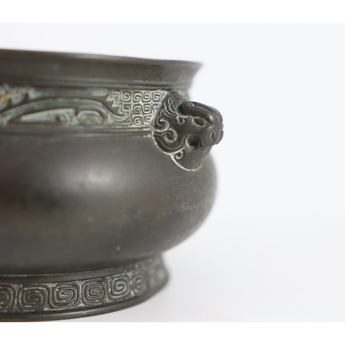 263 - A Chinese archaistic bronze censer, gui, 17th/18th century, cast with a pair of mythical beast mask ... 