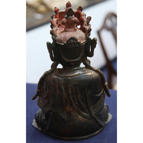 264 - A Chinese lacquered bronze seated figure of Guanyin, possibly Ming dynasty, 31cm high