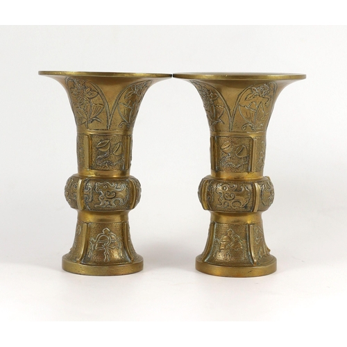 265 - A pair of Chinese bronze vases, gu, 18th/19th century each cast in relief with butterflies and lotus... 