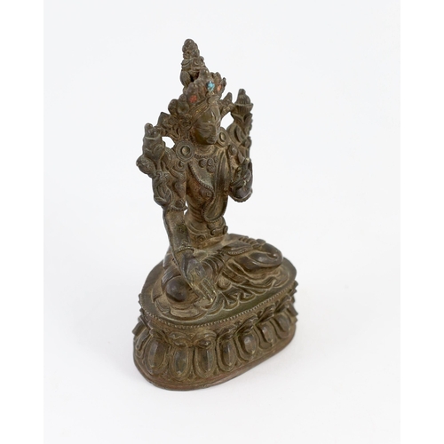 266 - A Tibetan bronze seated figure of White Tara, 17th/18th century, 11 cm high