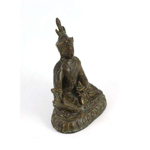 267 - A Nepalese bronze figure of a Bodhisattva, possibly Vajrasattva, 18.5 cm high