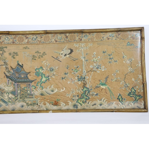 273 - A Chinese apricot ground embroidered silk table frontal, late Qing dynasty, finely worked with a cen... 