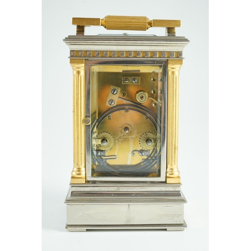 274 - A  late 19th century French hour repeating silvered and gilt brass carriage clock, in architectural ... 