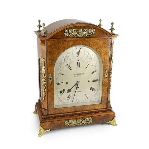 279 - George Blackie, 392 Strand, London. A late Victorian figured walnut repeating chiming bracket clock,... 