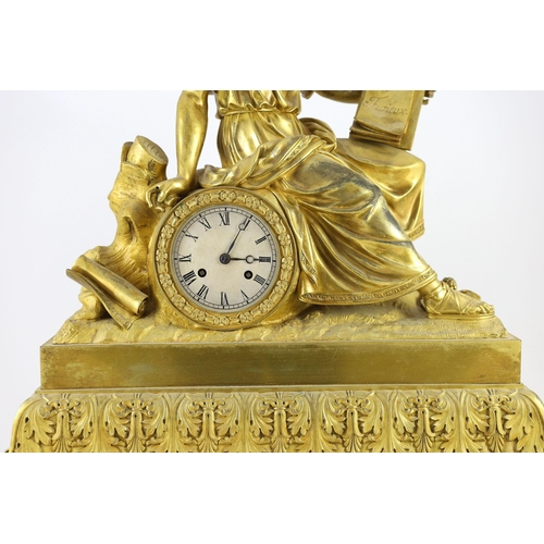 281 - A mid 19th century French ormolu mantel clock, modelled with a seated philosopher holding a tablet i... 