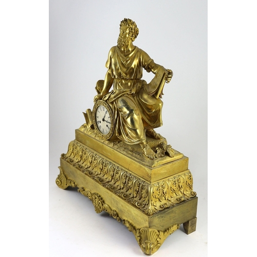 281 - A mid 19th century French ormolu mantel clock, modelled with a seated philosopher holding a tablet i... 