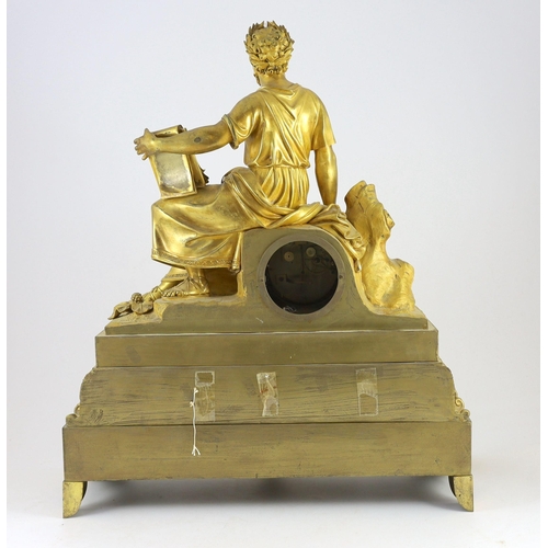 281 - A mid 19th century French ormolu mantel clock, modelled with a seated philosopher holding a tablet i... 