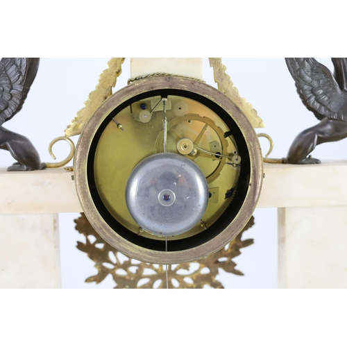 284 - Jean Baptiste Dubuc L'ne à  Paris.  A Louis XVI bronze and ormolu mounted white marble mantel clock,... 