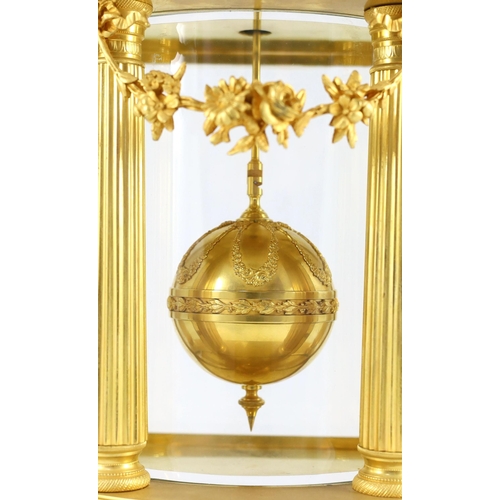 287 - An early 20th century French ormolu 400 day mantel clock, in architectural case with floral swagged ... 