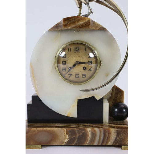 288 - F.H. Danvin. A 1930's French Art Deco bronze mounted onyx and marble clock garniture, the central ma... 