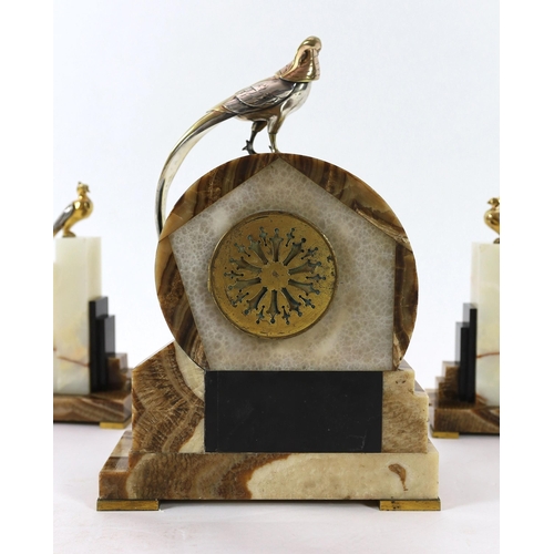 288 - F.H. Danvin. A 1930's French Art Deco bronze mounted onyx and marble clock garniture, the central ma... 