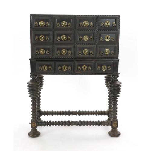 297 - A 17th century Portuguese brass mounted ebonised rosewood Contador on stand With twelve ripple mould... 