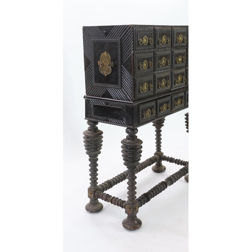 297 - A 17th century Portuguese brass mounted ebonised rosewood Contador on stand With twelve ripple mould... 