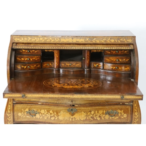 299 - An early 19th century Dutch walnut and floral marquetry bombe cylinder bureau, inlaid throughout wit... 