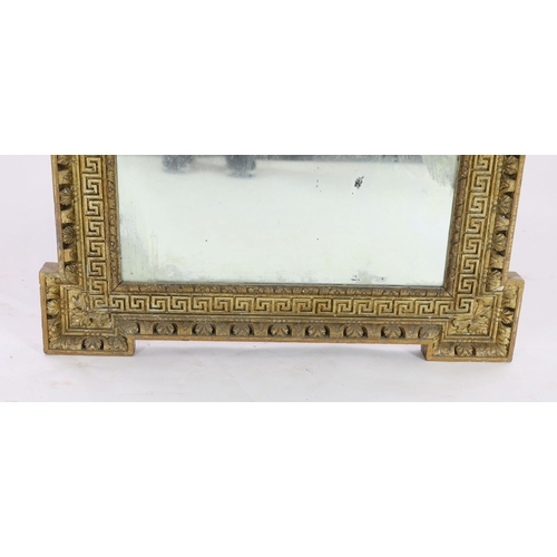 304 - A George II carved giltwood Adam design wall mirror, with broken arch pediment, raised flower and fr... 