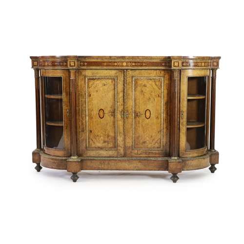 323 - A Victorian walnut and marquetry side cabinet, with central twin panelled doors and bowed glazed doo... 