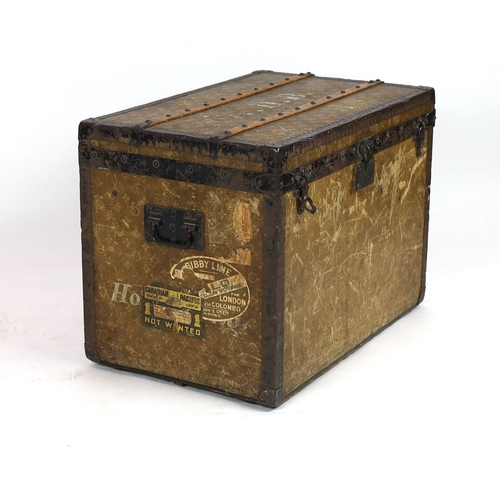 44 - An early 20th century Louis Vuitton iron bound travelling trunk, with yellow LV fabric covering and ... 