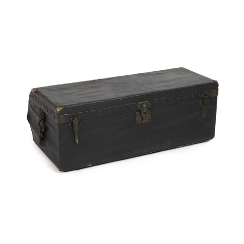 45 - A Louis Vuitton motoring trunk, with studded black leather covering, and brass loop handles with rem... 