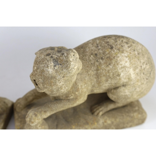 49 - A pair of 19th century carved marble models of crouching cats, width 32cm, depth 12cm, height 22cm... 