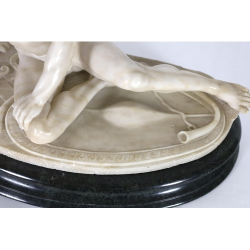 50 - A late 19th century carved alabaster model of The Dying Gaul, on integral oval base, and moulded gre... 