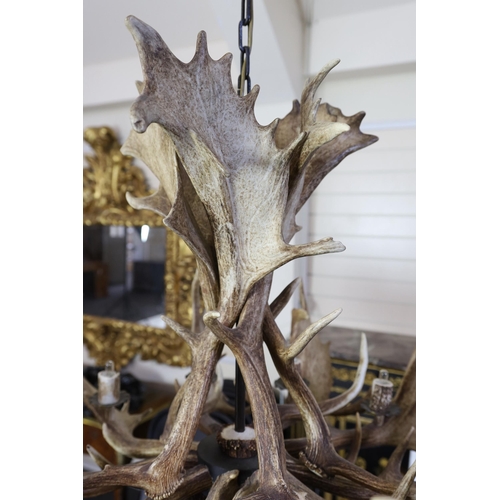 59 - A moose antler ten branch electrolier, 70cm drop, 110cm diameter