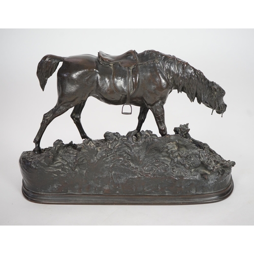 65 - Pierre Jules Mène (French, 1810-1879). A bronze group of a saddled horse standing upon a mound with ... 